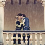 in act v, scene i of romeo and juliet, what role does balthasar play in the catastrophe?