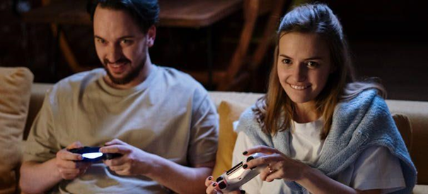 a happy couple gaming