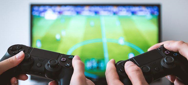 close up of two people gaming – when you call it gaming, but your brain calls it coping